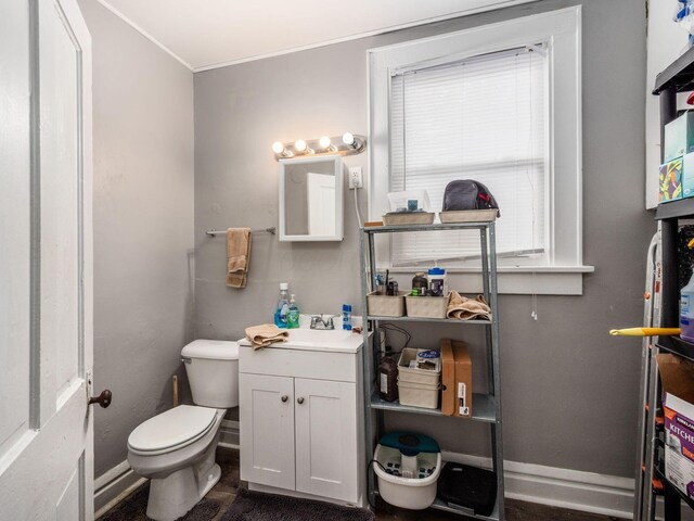 1364-1366 S 3rd St, Columbus, OH 43207 - half bath with vanity, toilet, ornamental molding, and baseboards