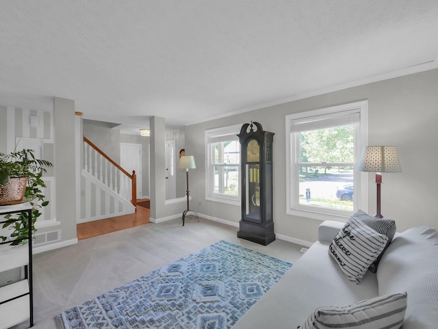 832 Lynnfield Dr, Westerville, OH 43081 - carpeted living room featuring stairway and baseboards