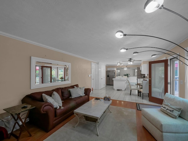 832 Lynnfield Dr, Westerville, OH 43081 - living area with ornamental molding, a textured ceiling, and ceiling fan