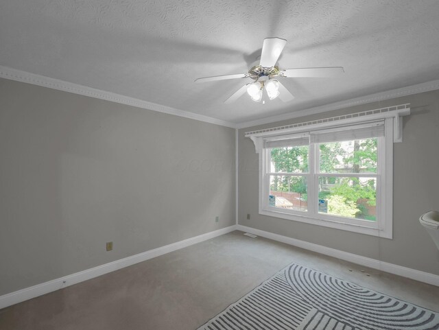 832 Lynnfield Dr, Westerville, OH 43081 - spare room with light colored carpet, a ceiling fan, a textured ceiling, and crown molding