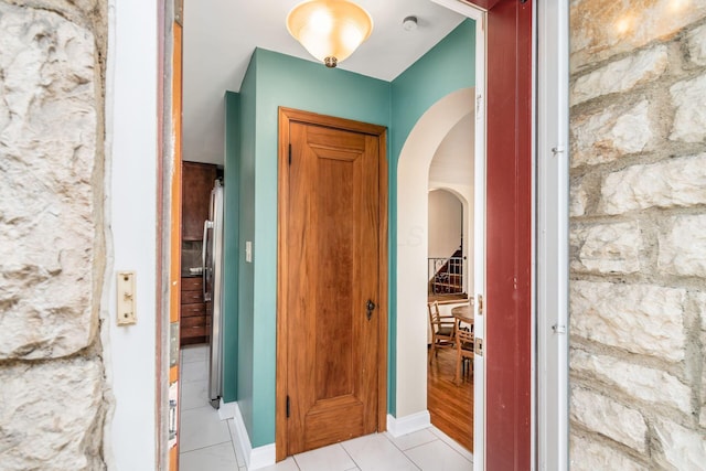 328 Chatham Rd, Columbus, OH 43214 - hall featuring arched walkways and light tile patterned floors