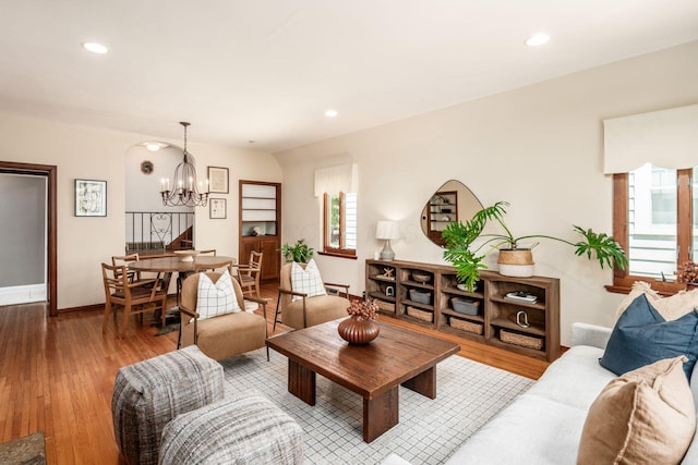 328 Chatham Rd, Columbus, OH 43214 - living area featuring a chandelier, hardwood / wood-style flooring, recessed lighting, and stairway
