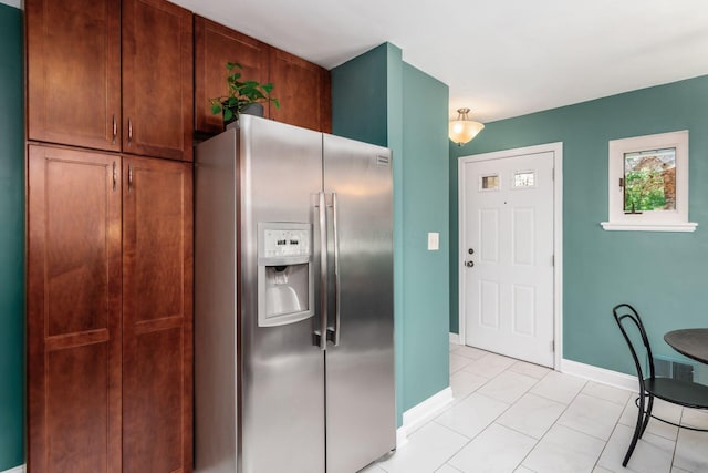 328 Chatham Rd, Columbus, OH 43214 - kitchen featuring stainless steel fridge with ice dispenser and light tile patterned flooring
