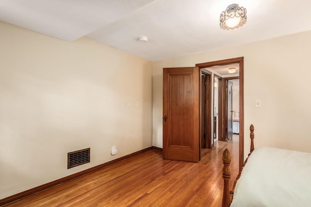328 Chatham Rd, Columbus, OH 43214 - unfurnished bedroom with light wood-style flooring and baseboards