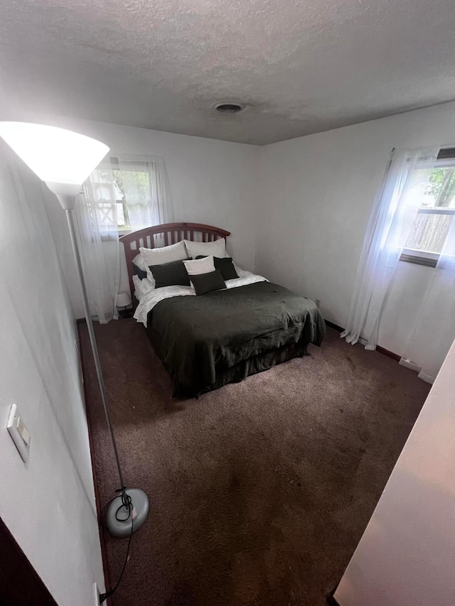 157 Saratoga Dr, Johnstown, OH 43031 - bedroom with carpet floors and a textured ceiling
