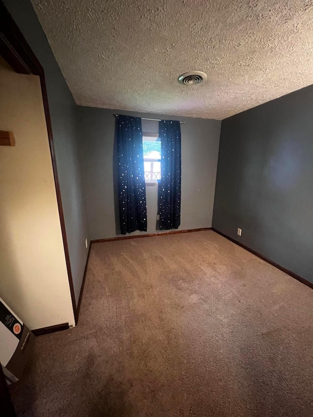 157 Saratoga Dr, Johnstown, OH 43031 - carpeted spare room featuring baseboards and a textured ceiling