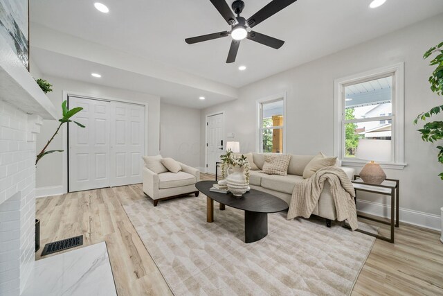 591 S 22nd St, Columbus, OH 43205 - living room featuring light wood-style floors, a ceiling fan, and recessed lighting
