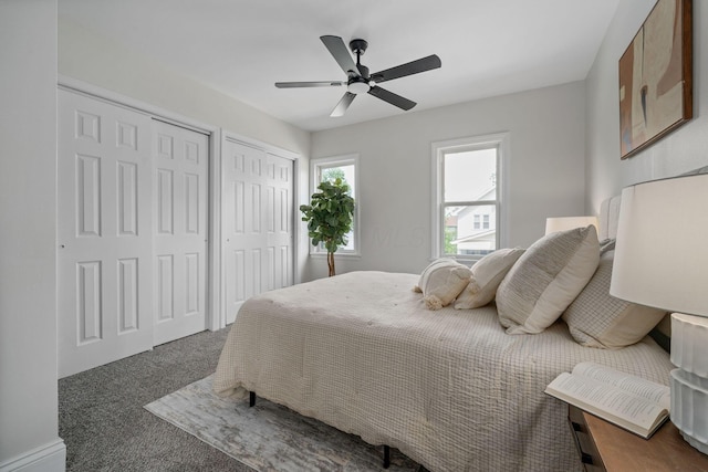 591 S 22nd St, Columbus, OH 43205 - bedroom featuring two closets, carpet flooring, and ceiling fan