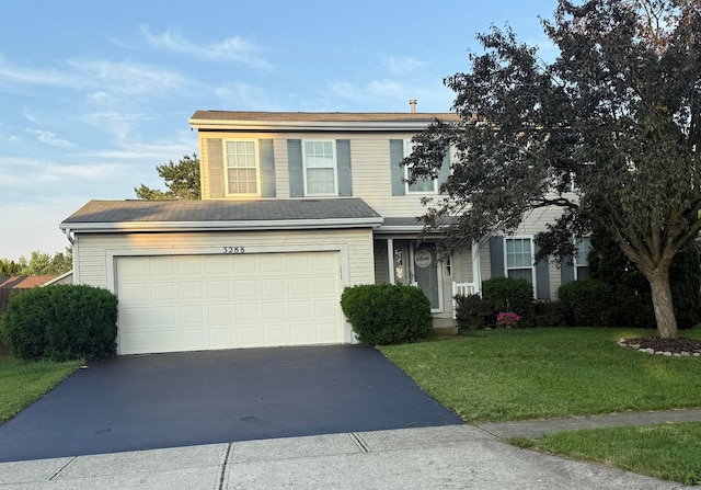 3288 Foxpoint Dr, Hilliard, OH 43026 - traditional home featuring driveway, a front yard, and a garage