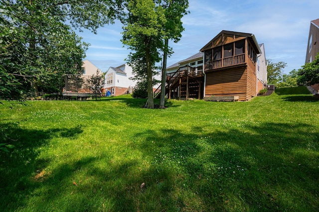 1355 Fisher Run Ct, Columbus, OH 43235 - view of green lawn featuring a sunroom, a wooden deck, and stairway