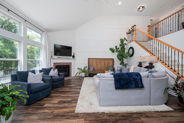 1355 Fisher Run Ct, Columbus, OH 43235 - living room featuring vaulted ceiling, stairway, dark wood-style floors, a fireplace, and ceiling fan