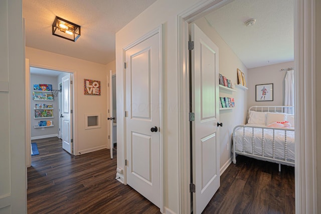 1355 Fisher Run Ct, Columbus, OH 43235 - hallway with dark wood-type flooring and baseboards