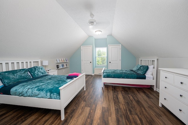 1355 Fisher Run Ct, Columbus, OH 43235 - bedroom featuring a textured ceiling, dark wood-type flooring, and lofted ceiling