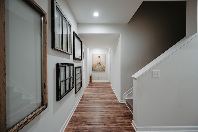 1355 Fisher Run Ct, Columbus, OH 43235 - hall with wood finished floors, stairway, and recessed lighting