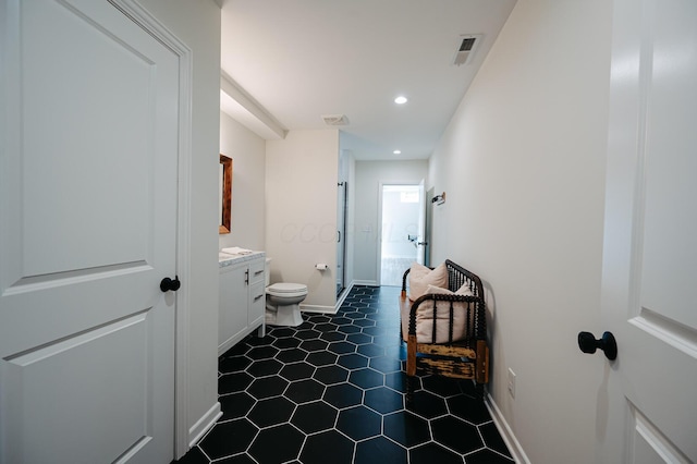 1355 Fisher Run Ct, Columbus, OH 43235 - bathroom with vanity, tile patterned floors, and recessed lighting