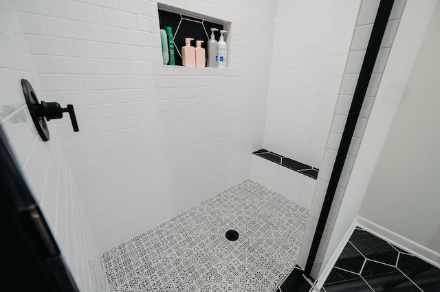 1355 Fisher Run Ct, Columbus, OH 43235 - full bathroom featuring a tile shower and tile patterned flooring