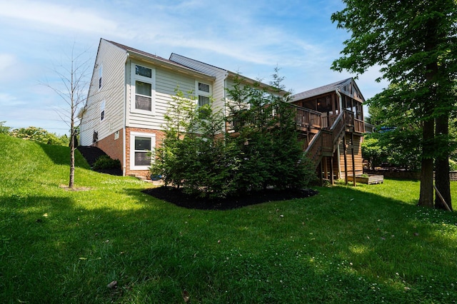 1355 Fisher Run Ct, Columbus, OH 43235 - rear view of property featuring brick siding, stairs, a yard, and a sunroom
