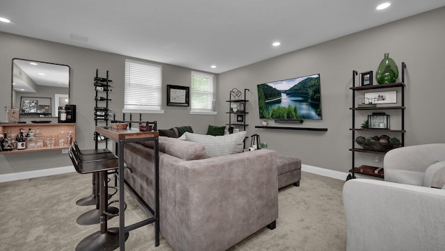 1098 Oregon Ave, Columbus, OH 43201 - living room featuring light colored carpet, recessed lighting, and a dry bar