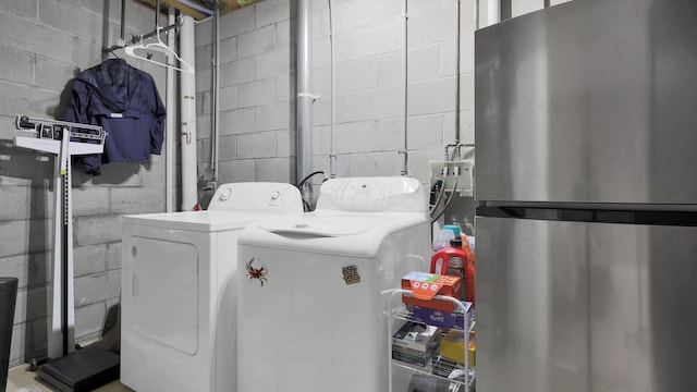 1098 Oregon Ave, Columbus, OH 43201 - washroom featuring concrete block wall and separate washer and dryer