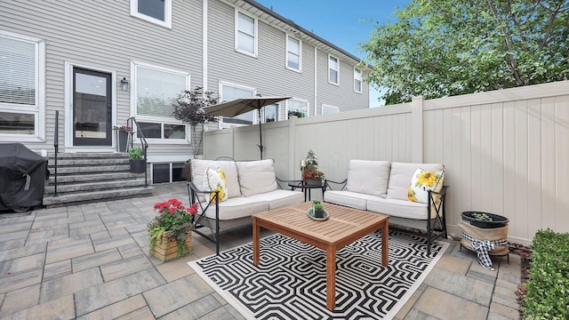 1098 Oregon Ave, Columbus, OH 43201 - fenced backyard with an outdoor hangout area, a patio, entry steps, and a grill
