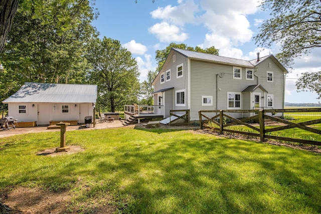 2380 Cedar Hill Rd SW, Amanda, OH 43102 - rear view of house with a deck, a patio, a metal roof, and an outbuilding