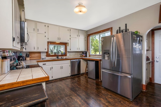 2380 Cedar Hill Rd SW, Amanda, OH 43102 - kitchen with stainless steel appliances, tile counters, dark wood-type flooring, and backsplash