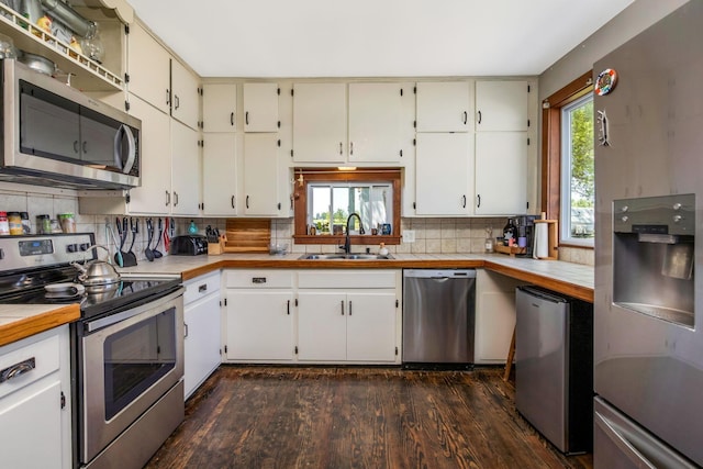 2380 Cedar Hill Rd SW, Amanda, OH 43102 - kitchen featuring stainless steel appliances, dark wood finished floors, and backsplash