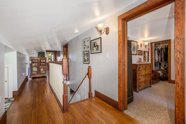 2380 Cedar Hill Rd SW, Amanda, OH 43102 - hallway with an upstairs landing, wood finished floors, and vaulted ceiling