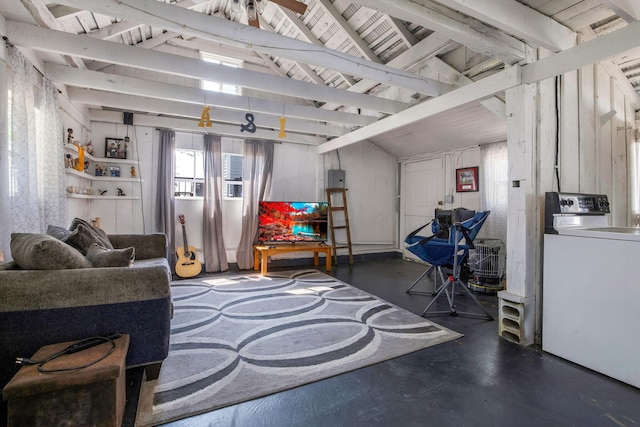 2380 Cedar Hill Rd SW, Amanda, OH 43102 - living area featuring healthy amount of natural light, vaulted ceiling, finished concrete flooring, and washer / dryer