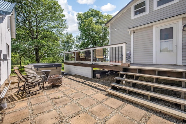 2380 Cedar Hill Rd SW, Amanda, OH 43102 - view of patio with a hot tub, a deck, and a fire pit