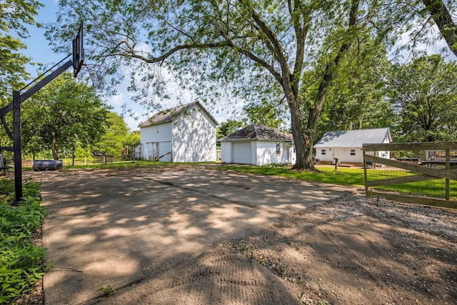 2380 Cedar Hill Rd SW, Amanda, OH 43102 - view of side of property with a garage and an outbuilding