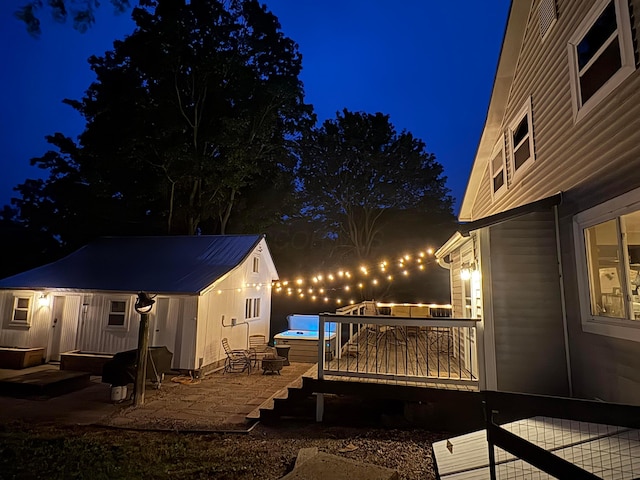 2380 Cedar Hill Rd SW, Amanda, OH 43102 - property exterior at twilight with a patio, a hot tub, and a wooden deck