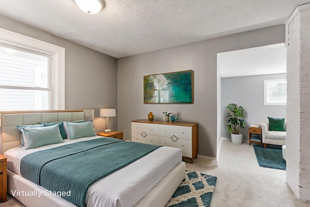 334 S Richardson Ave, Columbus, OH 43204 - bedroom featuring light colored carpet and a textured ceiling