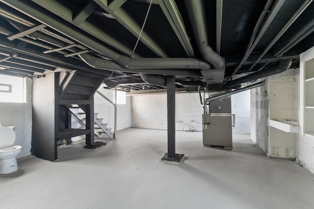 334 S Richardson Ave, Columbus, OH 43204 - below grade area featuring stairs and heating unit
