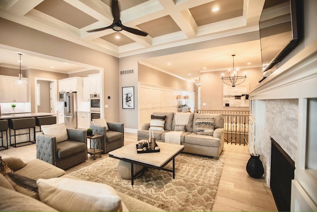 8210 Lilium Way, Plain City, OH 43064 - living room with recessed lighting, coffered ceiling, ceiling fan, light wood-style flooring, and a chandelier