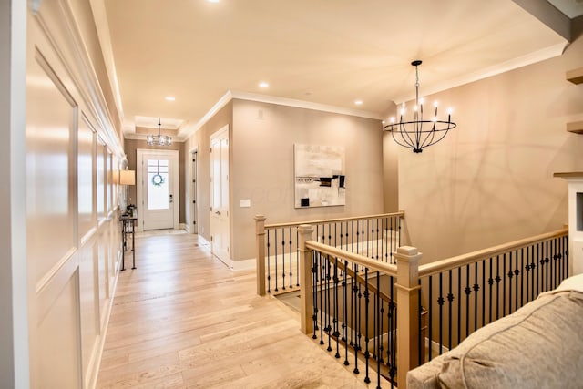 8210 Lilium Way, Plain City, OH 43064 - hall with a chandelier, ornamental molding, an upstairs landing, wood finished floors, and recessed lighting