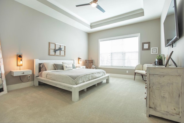 8210 Lilium Way, Plain City, OH 43064 - carpeted bedroom featuring baseboards, a ceiling fan, and a raised ceiling