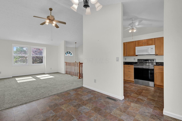 7879 Sudeley Ct, Westerville, OH 43081 - unfurnished living room with a ceiling fan, dark stone finish flooring, dark carpet, and high vaulted ceiling
