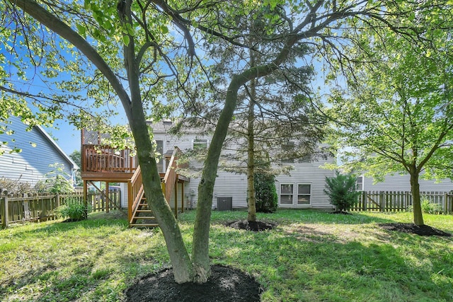 7879 Sudeley Ct, Westerville, OH 43081 - fenced backyard with a wooden deck and stairs