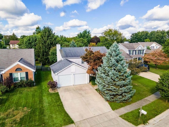 7879 Sudeley Ct, Westerville, OH 43081 - traditional-style house featuring driveway, a front lawn, a chimney, and an attached garage