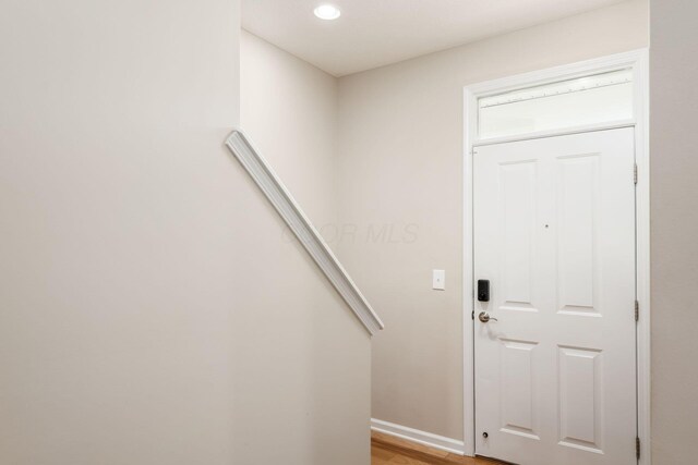 4609 Stoneworth Dr Unit 58, Hilliard, OH 43026 - foyer with recessed lighting, baseboards, and light wood-style flooring