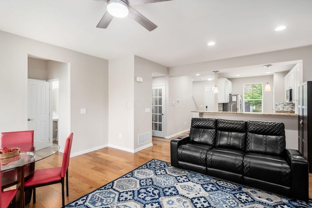 4609 Stoneworth Dr Unit 58, Hilliard, OH 43026 - living room with ceiling fan, light wood-style flooring, baseboards, and recessed lighting