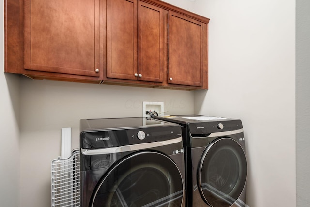 4609 Stoneworth Dr Unit 58, Hilliard, OH 43026 - washroom featuring independent washer and dryer and cabinet space