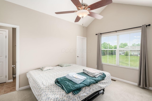 4609 Stoneworth Dr Unit 58, Hilliard, OH 43026 - bedroom with light colored carpet, baseboards, a ceiling fan, and high vaulted ceiling