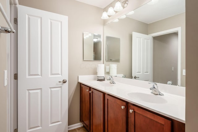 4609 Stoneworth Dr Unit 58, Hilliard, OH 43026 - bathroom with double vanity and baseboards