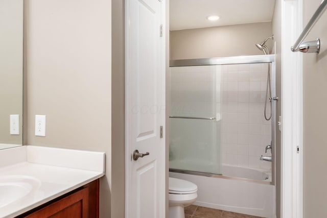 4609 Stoneworth Dr Unit 58, Hilliard, OH 43026 - full bathroom with vanity, toilet, shower / bath combination with glass door, and tile patterned flooring