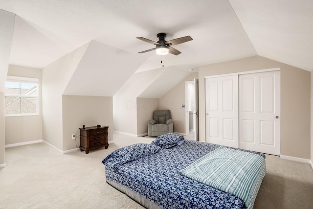 4609 Stoneworth Dr Unit 58, Hilliard, OH 43026 - bedroom featuring light colored carpet, vaulted ceiling, baseboards, and a closet