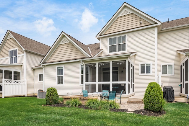 4609 Stoneworth Dr Unit 58, Hilliard, OH 43026 - rear view of house with a sunroom, cooling unit, a yard, and a patio area