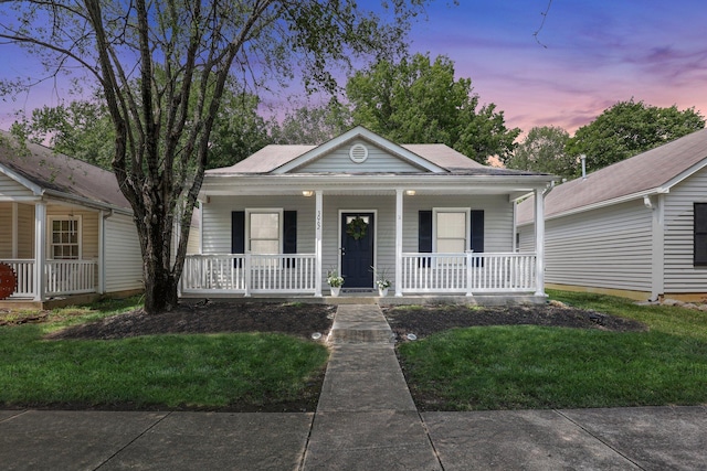 3062 Nomination Ln Unit 260, Columbus, OH 43207 - view of front of home featuring a porch and a front lawn