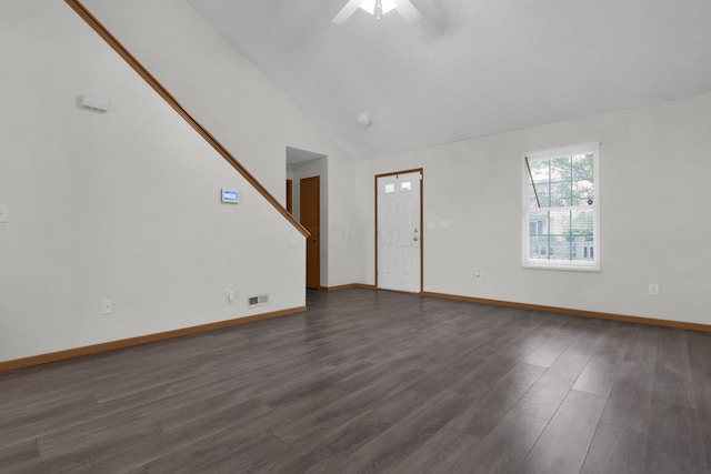 3062 Nomination Ln Unit 260, Columbus, OH 43207 - unfurnished living room with vaulted ceiling, dark wood-style floors, ceiling fan, and stairs